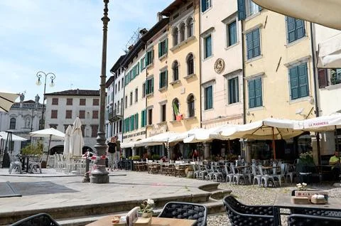 Colonnade and path, square of the freedom in Italian city Udine. Italy. Aug.. Stock Photos