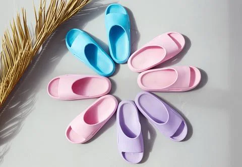 Color beach shoes on the floor. Summer style Still life Stock Photos
