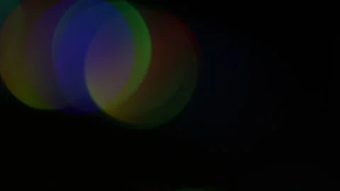 Color bokeh light leak reflection on black video Vidéo 309492098