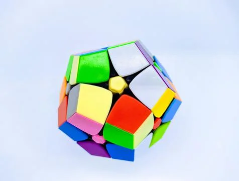 Color brain teaser on white background closeup photo. Stock Photos