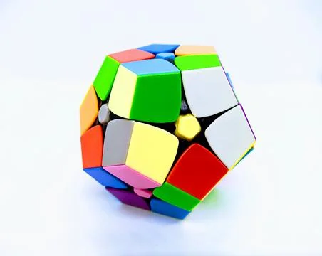 Color brain teaser on white background closeup photo. Stock Photos