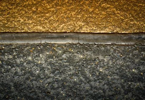 Color broken plaster on the wall Stock Photos