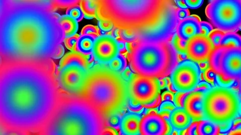 Color-changing particles spin in front of the camera. close-up. cinematic Stock Footage 83419690
