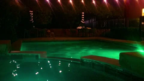Color changing water in a luxury pool Video stock 337499048
