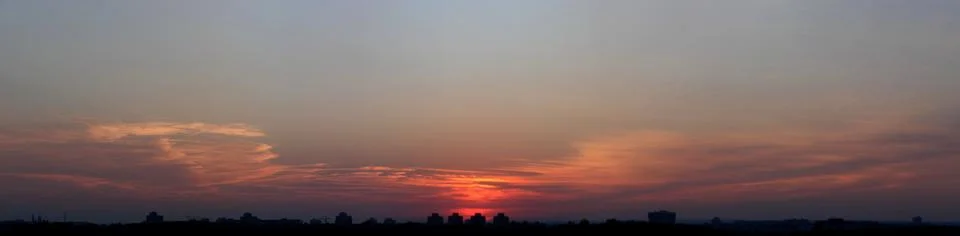 Color cloudy sunset panoramic view Stock Photos