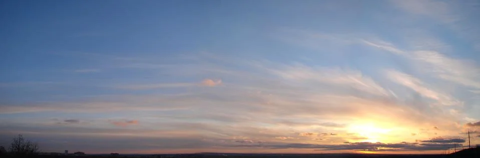 Color cloudy sunset panoramic view Stock Photos