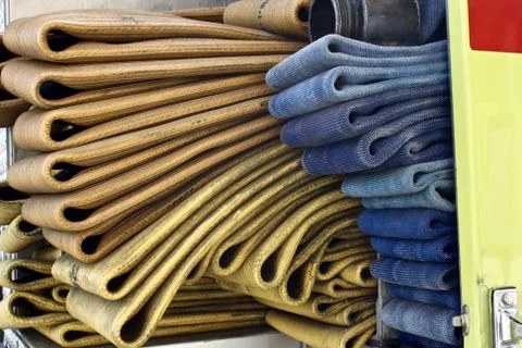 Color coded fire hose on fire truck Stock Photos