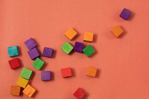 Color cubes close-up. The concept of creativity. red background Foto stock