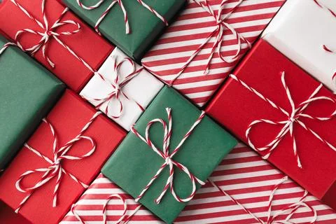 Color gift boxes on color background, flat lay Stock Photos
