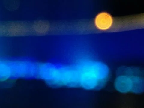 The color gradient is dark blue and light with luminous spots of azure and ye Stock Photos