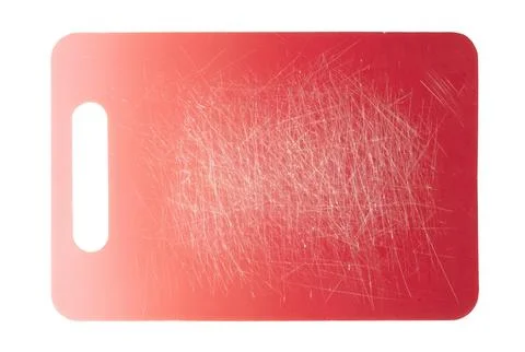 Color gradient red old plastic cutting board background with scratches Stock Photos