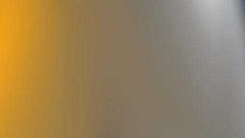 Color gradient shifting from gold to gray and silver Stock Footage 324928376