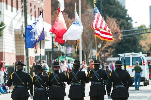 Color Guard Presents Colors While Walking In Atlanta Veterans Parade Stock Photos