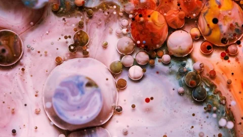 Color inks react to form a beautiful structure of paint bubbles Stock Footage 121222433