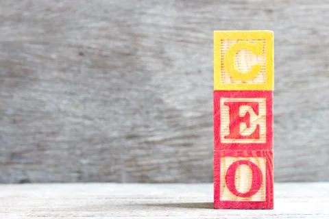 Color letter block in word CEO (Abbreviation of Chief Executive Officer) on w Stock Photos