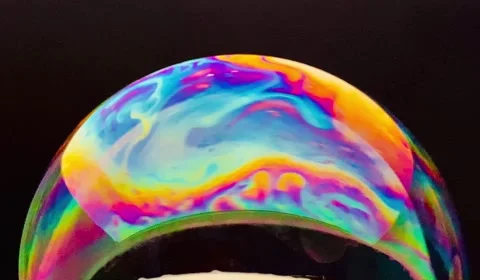 COLOR LIGHT REFLECTION ON BUBBLE OF SOAP Stock Footage 156506587