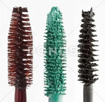 Color mascara brushes isolated on white macro Stock Photos
