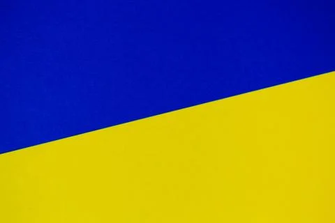 Color papers geometry flat composition background with yellow and blue tones 스톡 사진