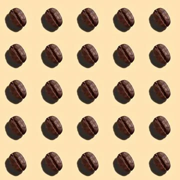 Color pattern of their coffee beans on a light background. Stock Photos