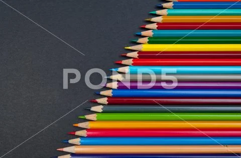Color pencils isolated on black background close up Stock Photos