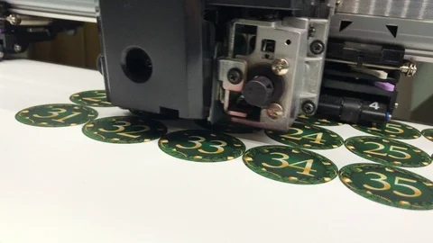 Color printing on wide format printer. Print Christmas stickers and posters Stock Footage 100407936