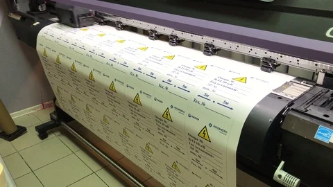 Color printing on wide format printer safety warning signs Vídeos de archivo 100407938