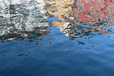 Color reflection on the water surface, abstract background. Stock Photos