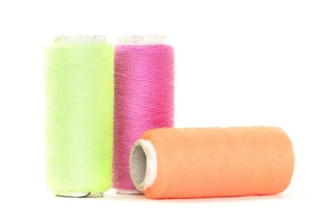 Color sewing thread with needle Stock Photos