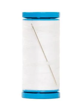 Color sewing thread with needle Stock Photos
