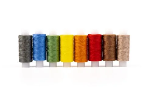 Color sewing threads isolated on white background. Different colors.Bright bo Stock Photos