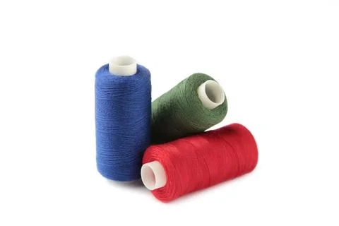 Color sewing threads isolated on white background Stock Photos