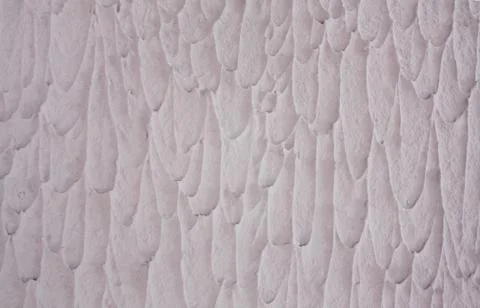 Color silicone plaster on the wall. Background Stock Photos