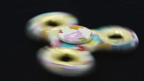 Color spinner rotates on black background Stock Footage 107008663