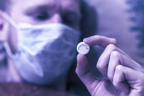 Color Of The Year 2022 - Very Peri. Covid-19 pill Stock Photos