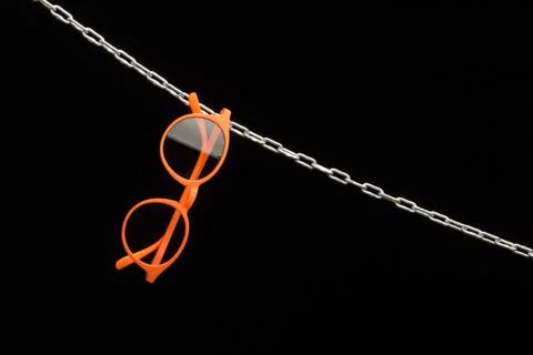 Colored and designer glasses and lenses Stock Photos