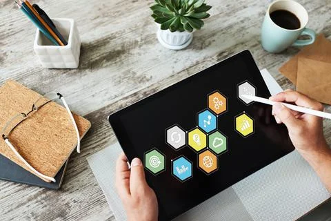 Colored application icons on device screen. Business, Internet and technology Foto stock