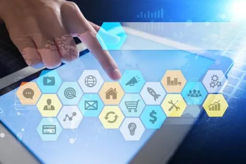 Colored applications icons and graphs on virtual screen. technology concept. Fotos Stock