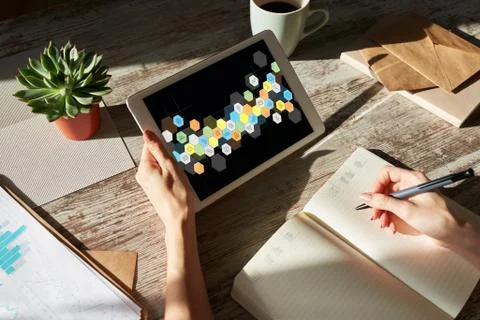 Colored APPS icons on tablet screen. Personal application and software Stock Photos