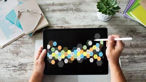 Colored APPS icons on tablet screen. Personal application and software Stock Photos