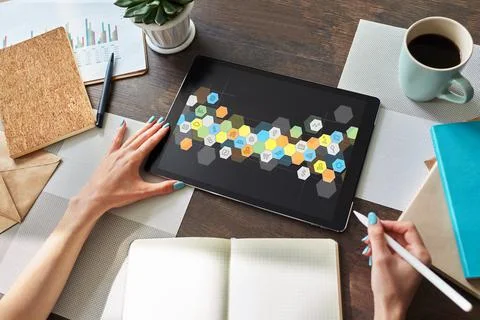 Colored APPS icons on tablet screen. Personal application and software Stock Photos
