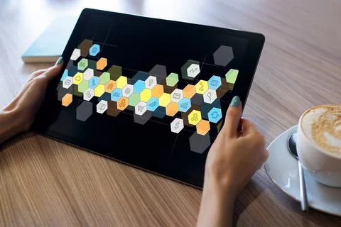Colored APPS icons on tablet screen. Personal application and software Stock Photos