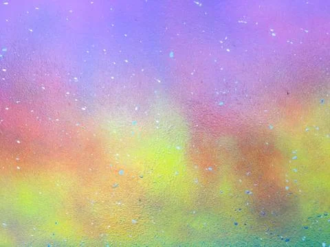 Colored background. The board is covered with colored paints. Stock Photos