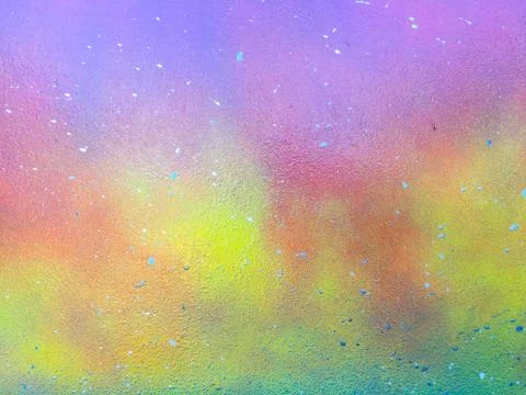 Colored background. The board is covered with colored paints. Stock Photos
