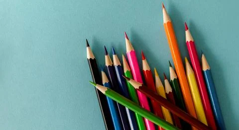 Colored background with colored pencils with space for text Stock Photos