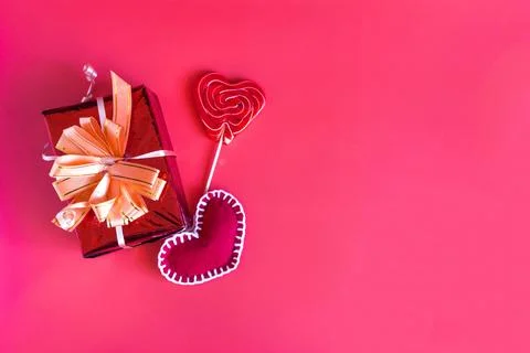 A colored background in a red color scheme with a colored box. Stock Photos