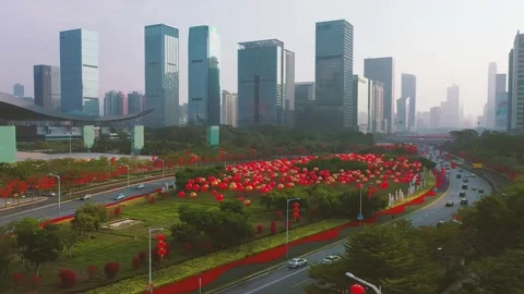 Colored ball lights line major roads in shenzhen during the Chinese New Year Stock Footage 148513016