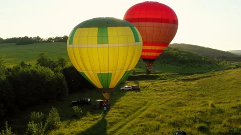 Colored balloons are ready to fly. Against the background of blue sky and sunset Stock Footage 195635606