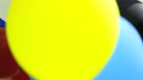 Colored balloons bounce and float Stock Footage 42174416