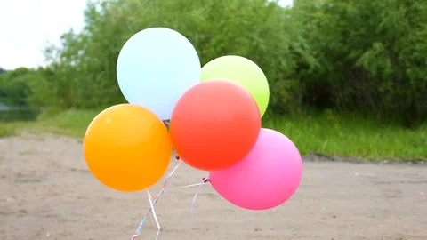 Colored balloons develop in the open air. Holiday Video stock 91354034