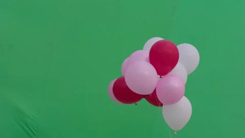 Colored balloons with green background for your video Stock Footage 167915930
